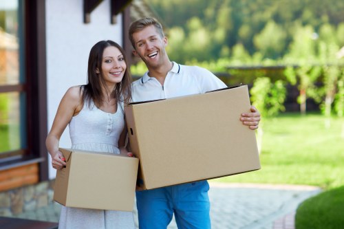 Household move preparation with labelled boxes and furniture