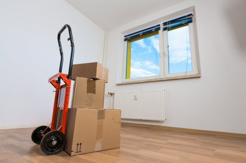Packed office equipment ready for relocation in Thamesmead